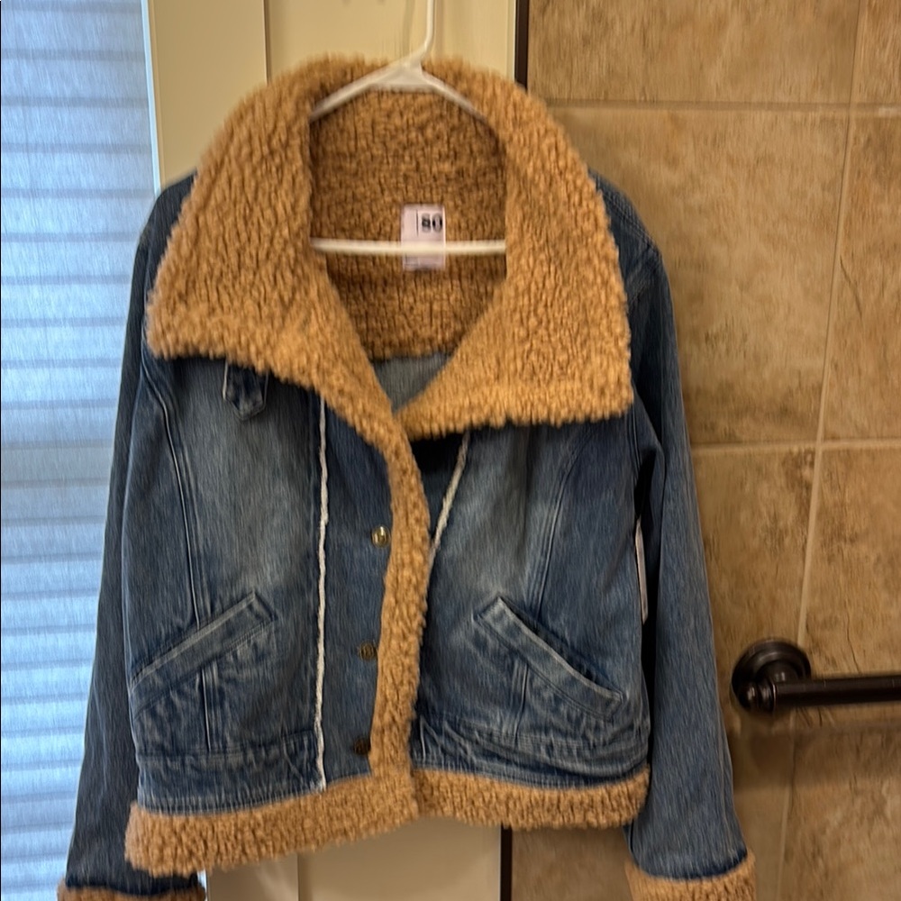 Adult size large Denim Moto Jacket w/Sherpa trim. Optional high neck collar. NWT